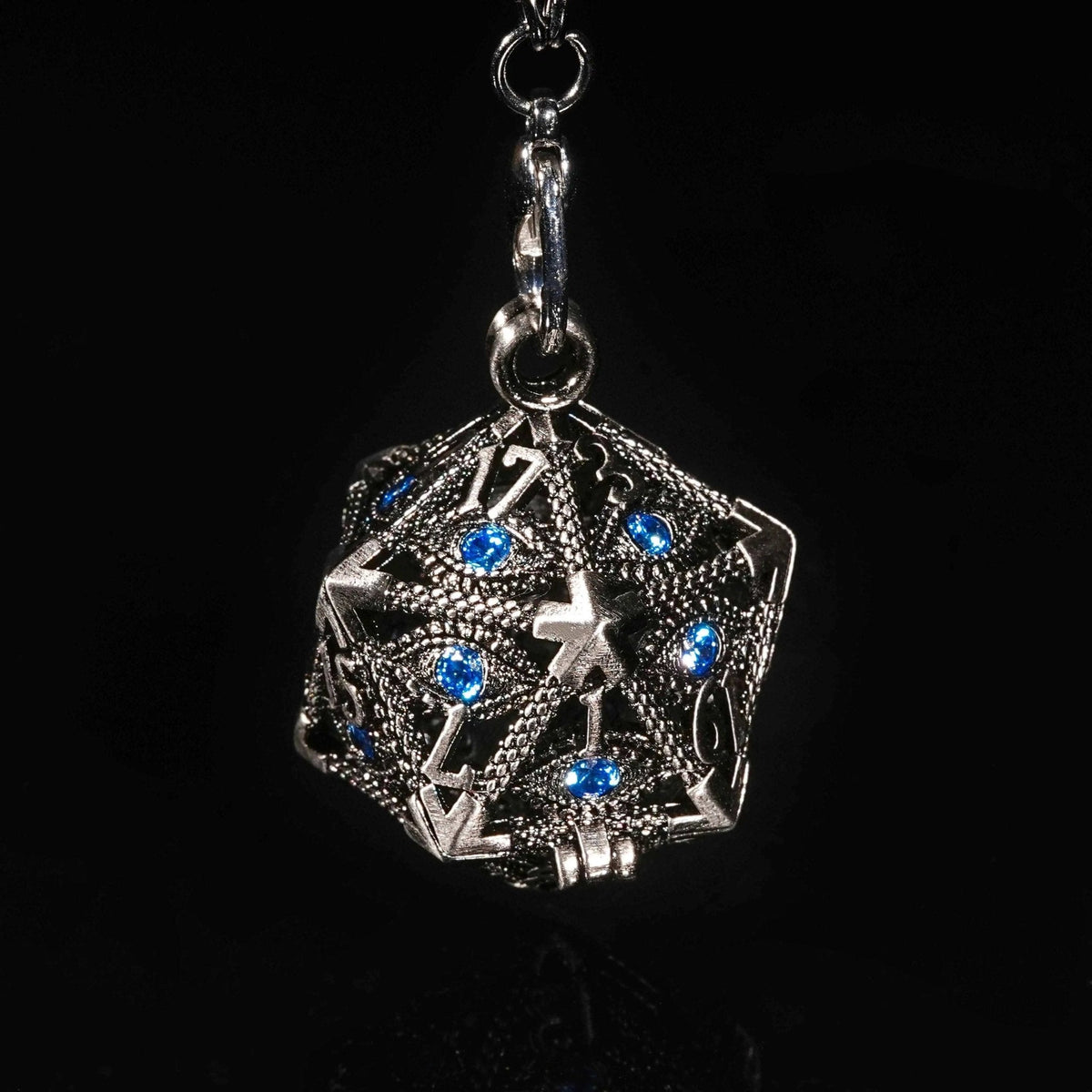 Mini metal dice set with compact storage cage