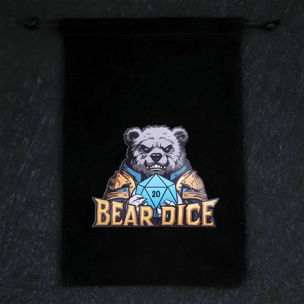 Bags Logo Dice Bag – Black velvet drawstring dice bag with the logo, holds 1-2 sets of standard-sized D&D dice