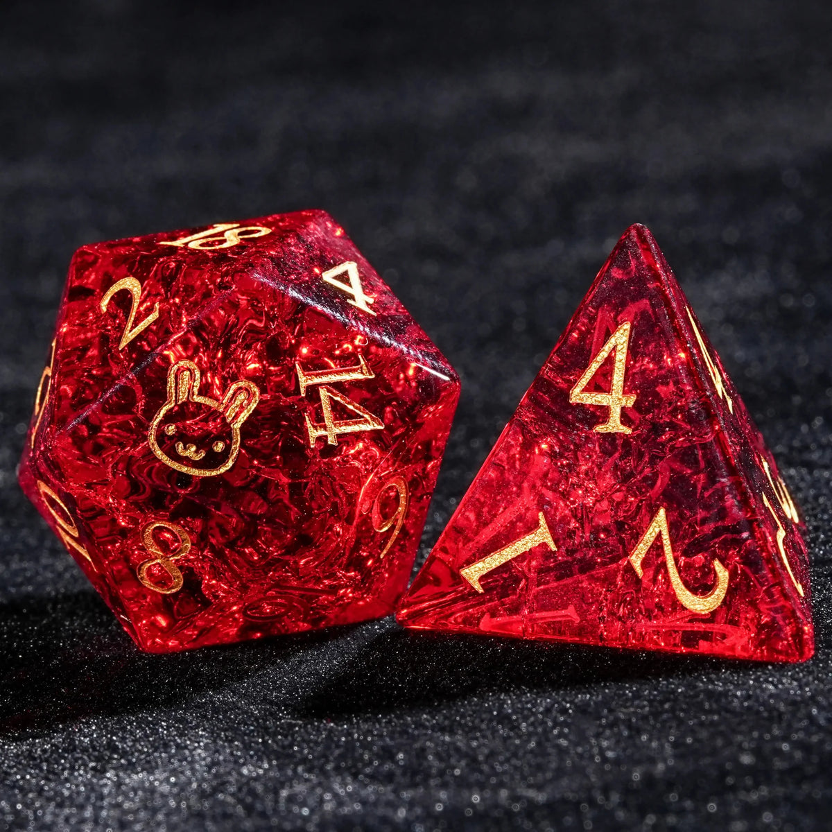 Burst Gem Gemstone DND Dice Set – Red glass DnD D20 dice with gold rabbit engraving and red glass D4 dice