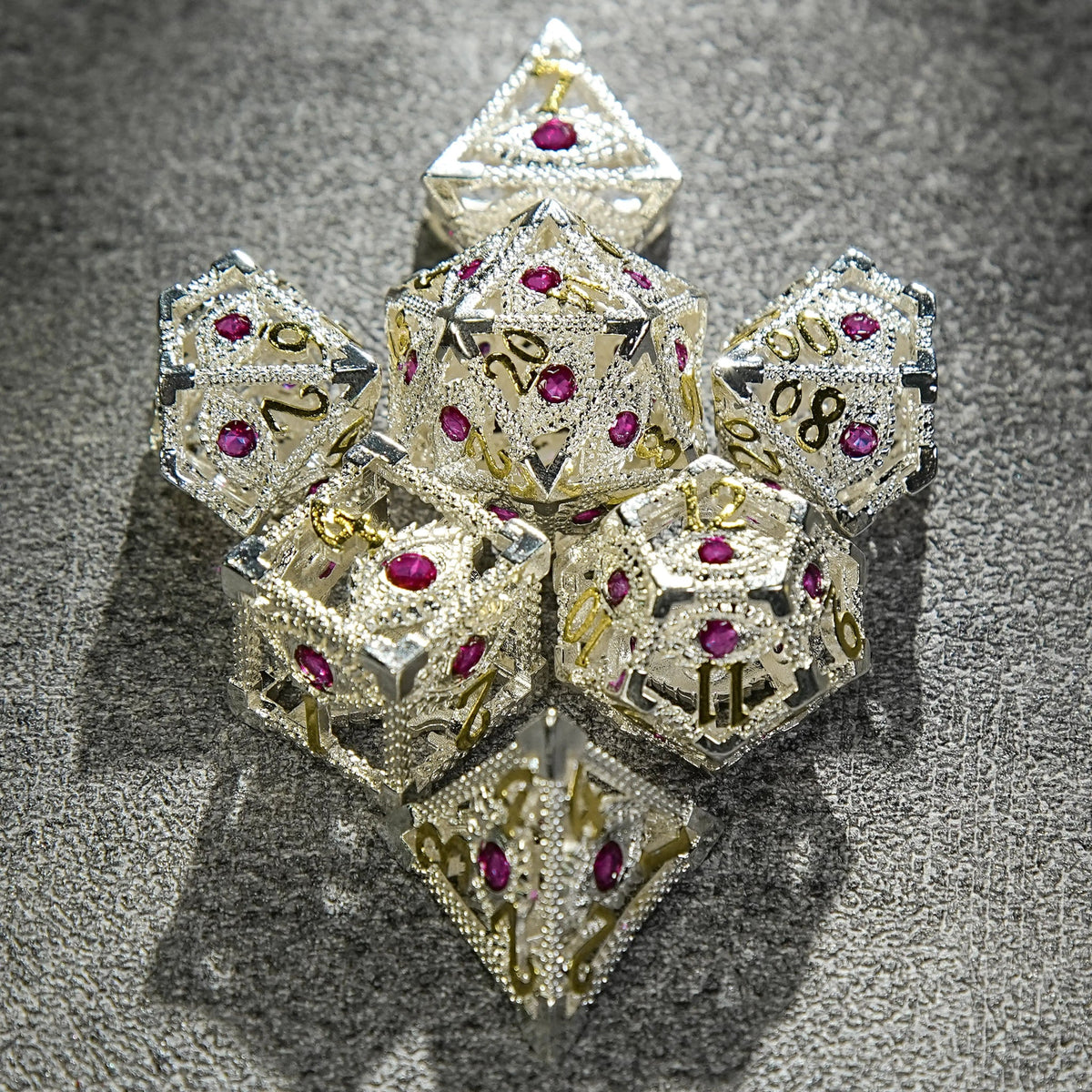 Dragon Metal DND Dice Set – Gems Eye – Silver with Pink Gems Dragon's Eye Hollow Metal RPG dice set