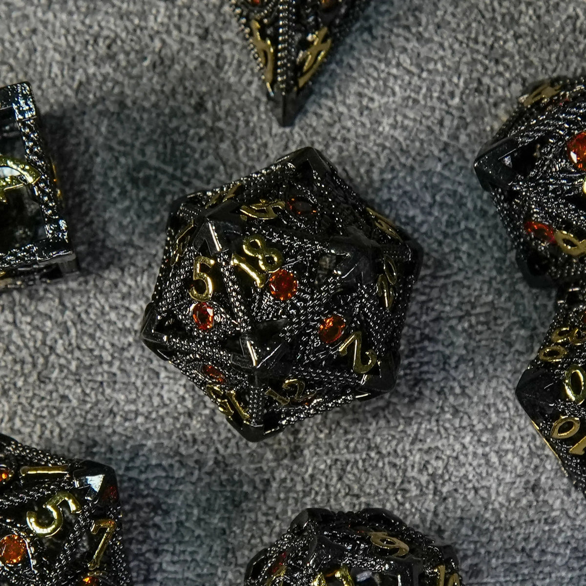 Dragon Metal DND Dice Set – Gold Numbers – Ruby Demon's Eye Black Metal Hollow D20 Dice with Engraved Gold Numbers