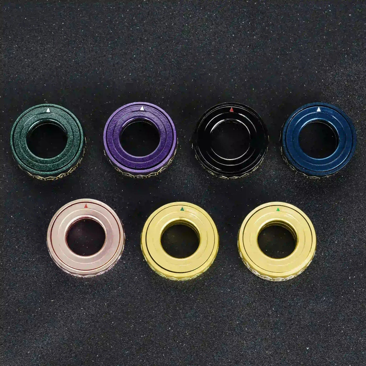 Fingertip Ring Metal Spinner Dice Set – 7 cool metallic D20 dice ring colors for fingertip spinning: gradient green