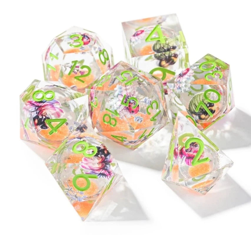 Flower Liquid Core Dice Set – Fantasy Flower Orange Liquid Core Resin Dice Set + Green Numbers
