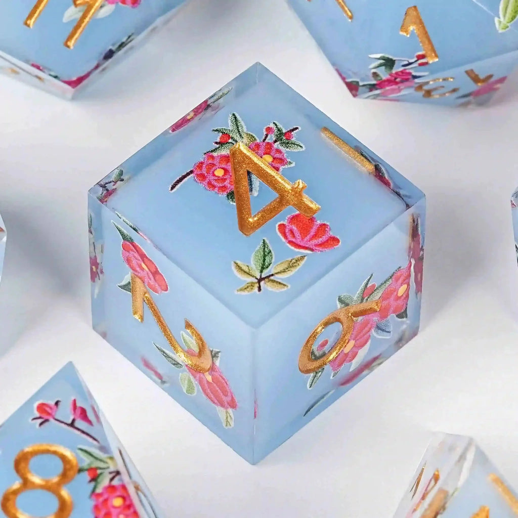 Flower Resin DND Dice Set – Gold Numbers – Light Light – DND D6 dice with light blue transparent resin and light red