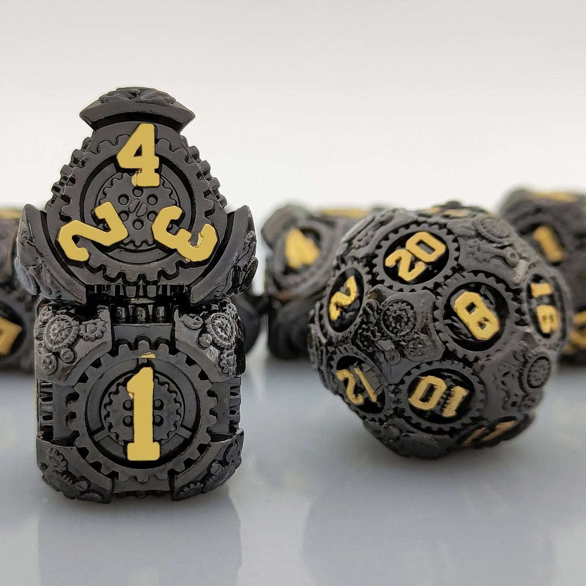 Gear Metal DND Dice Set – Cool black mechanical gear solid metal D&D dice set with gold numerals, perfect for tabletop