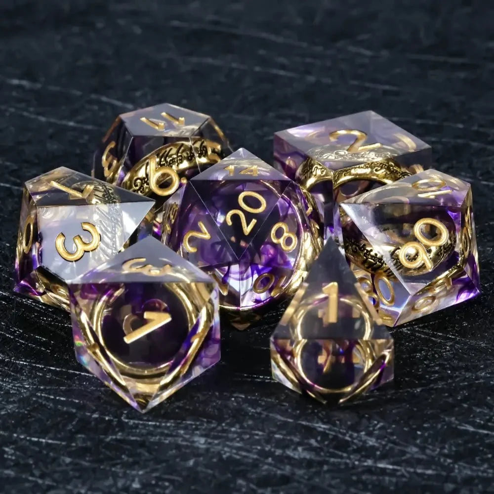 Gold Ring Resin Sharp Edge Dice Set – A set of sharp-edged purple transparent resin DND dice, including an engraved