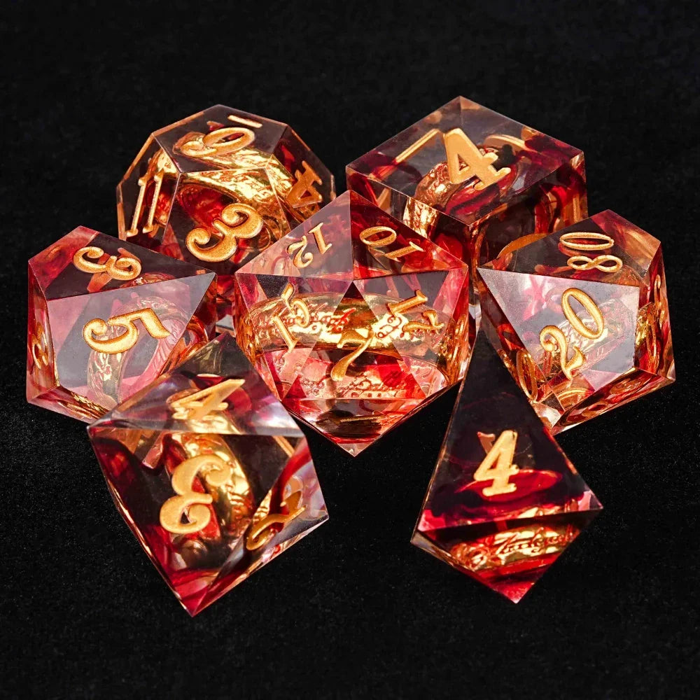Gold Ring Resin Sharp Edge Dice Set – A set of sharp-edged red transparent resin DND dice, including an engraved gold
