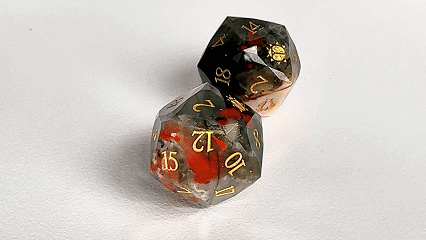 Khepri's Blessing Natural Stone DND Dice Set – Two natural bloodstone DND D20 dice engraved with "Khepri's Blessing"
