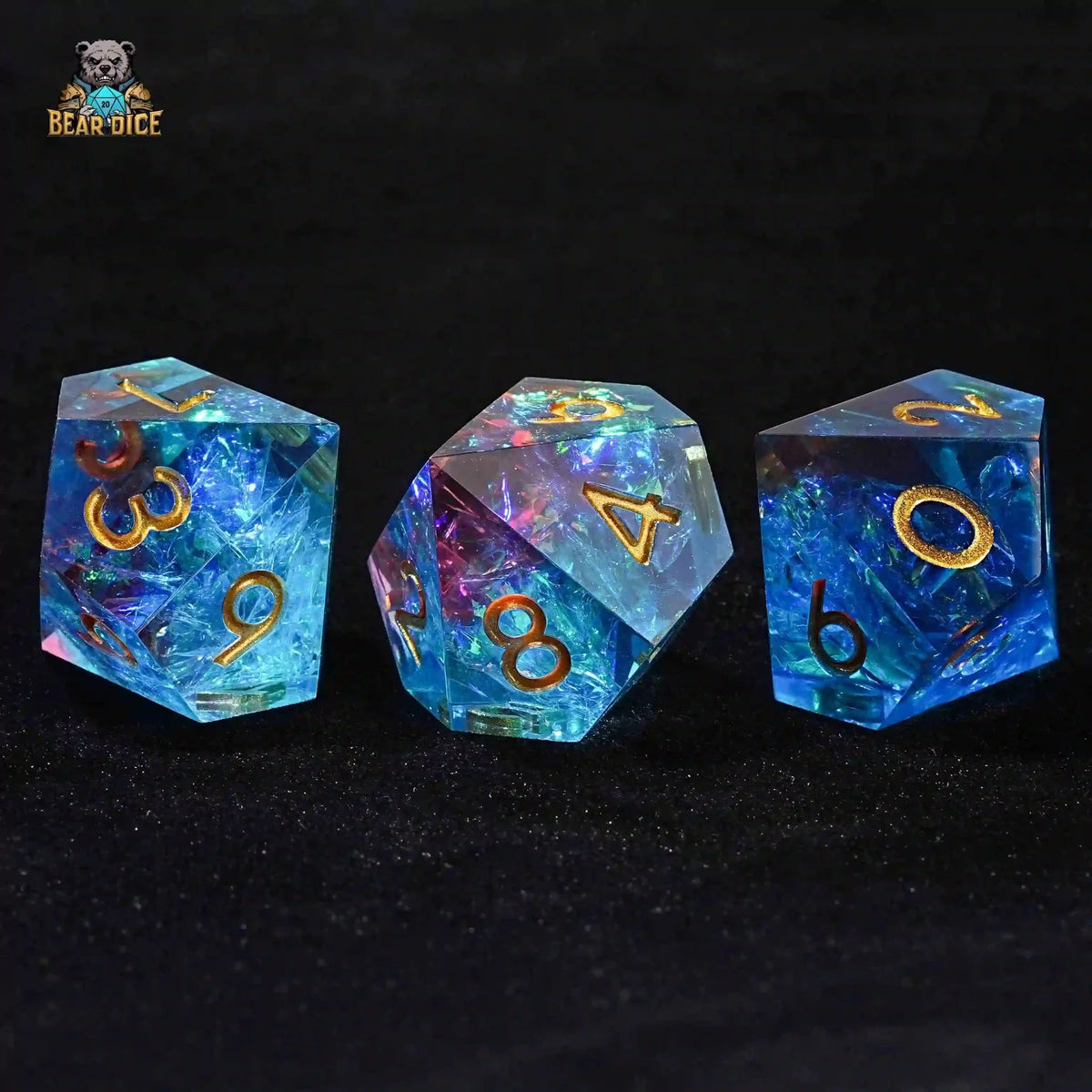 Made Glistening Resin D10 Dice – Gold Numbers – Three red and blue translucent resin D10 dice are neatly arranged on