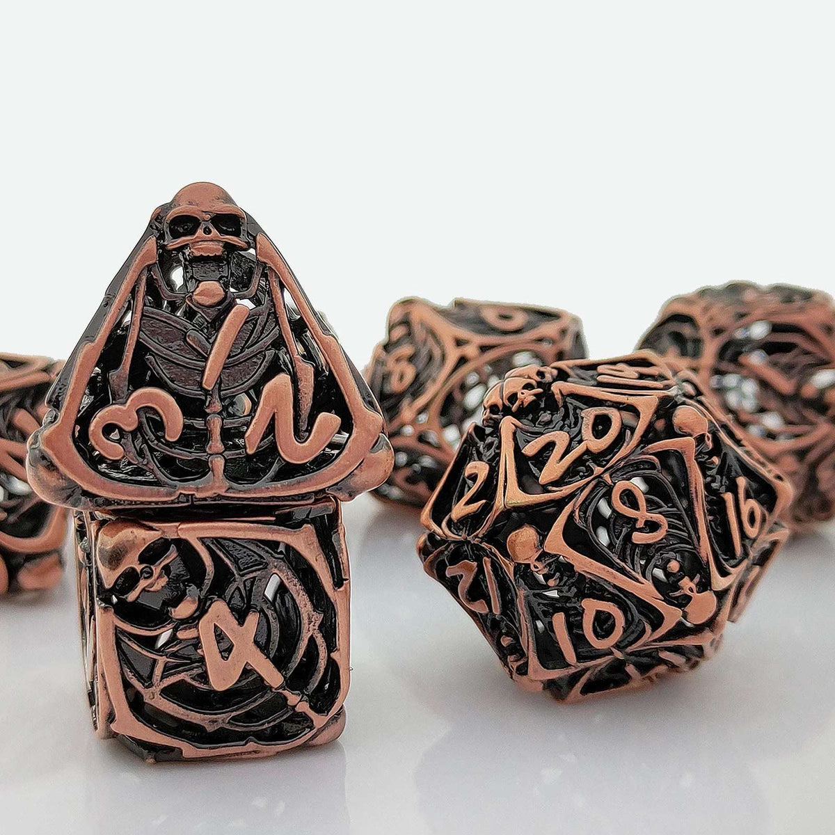 Necromancer Bronze Metal DND Dice Set – Necromancer Dice: Copper Metal Hollow Skull Dice Set