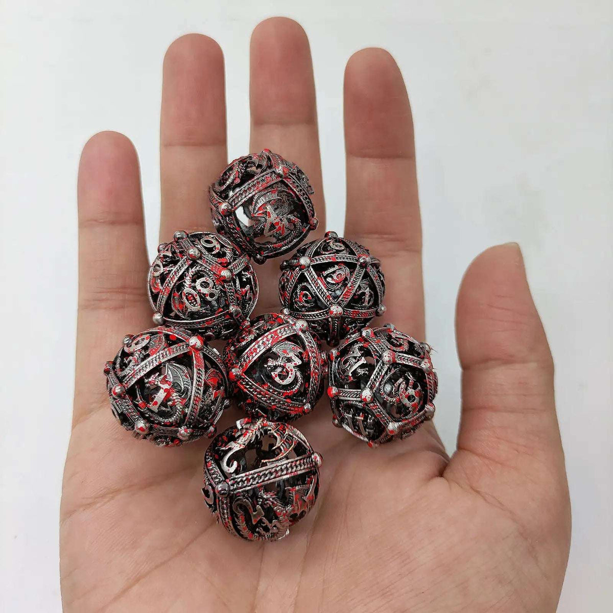 Pterosaur Metal DND Dice Set – Blood – Pteranodon Round Bloodstained Hollow Metal D&D Dice Set