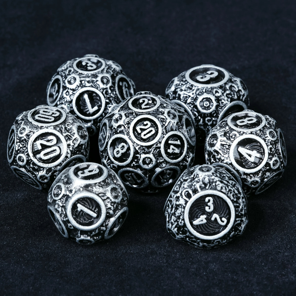 Spherical Planet Metal RPG Dice Set – Full – Spherical Planet Metal Dice Set D20 and D4 size comparison