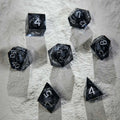Wizard Liquid Core Dice Set – Dark Sorcerer's Skull Frame Liquid Core Resin Dice Set Silver Font