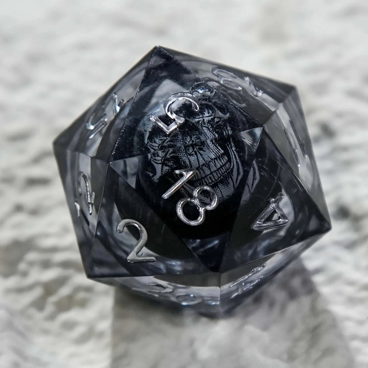 Wizard Liquid Core Dice Set – Dark Sorcerer's Skull Frame Liquid Core Resin Dice Set Silver Font