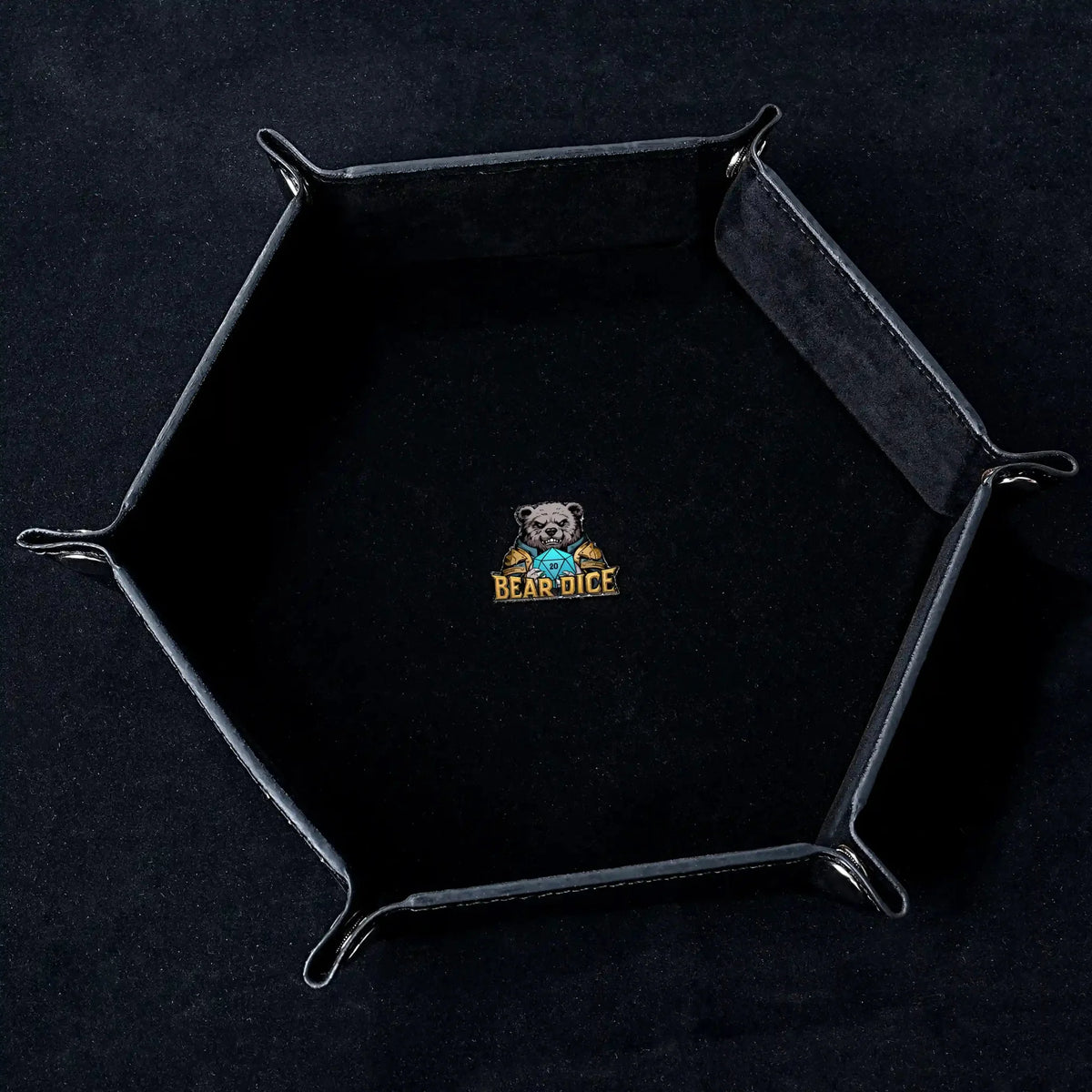 World Cup Dice Tray – Leather – Hexagonal black leather RPG dice tray with silver buckle, featuring the logo in the