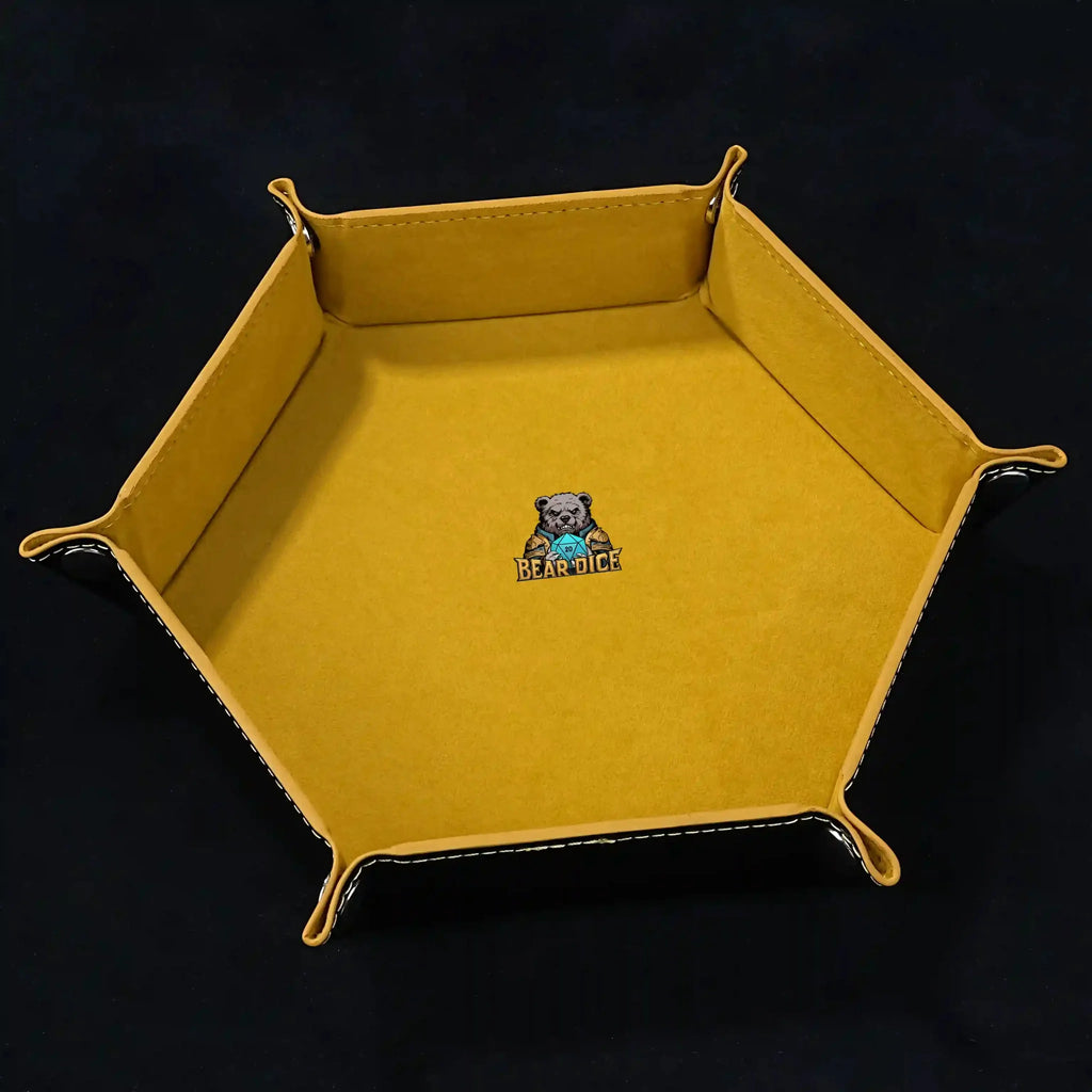 World Cup Dice Tray – Leather – Hexagonal black PU leather RPG dice tray with silver buttons. Yellow lining with the